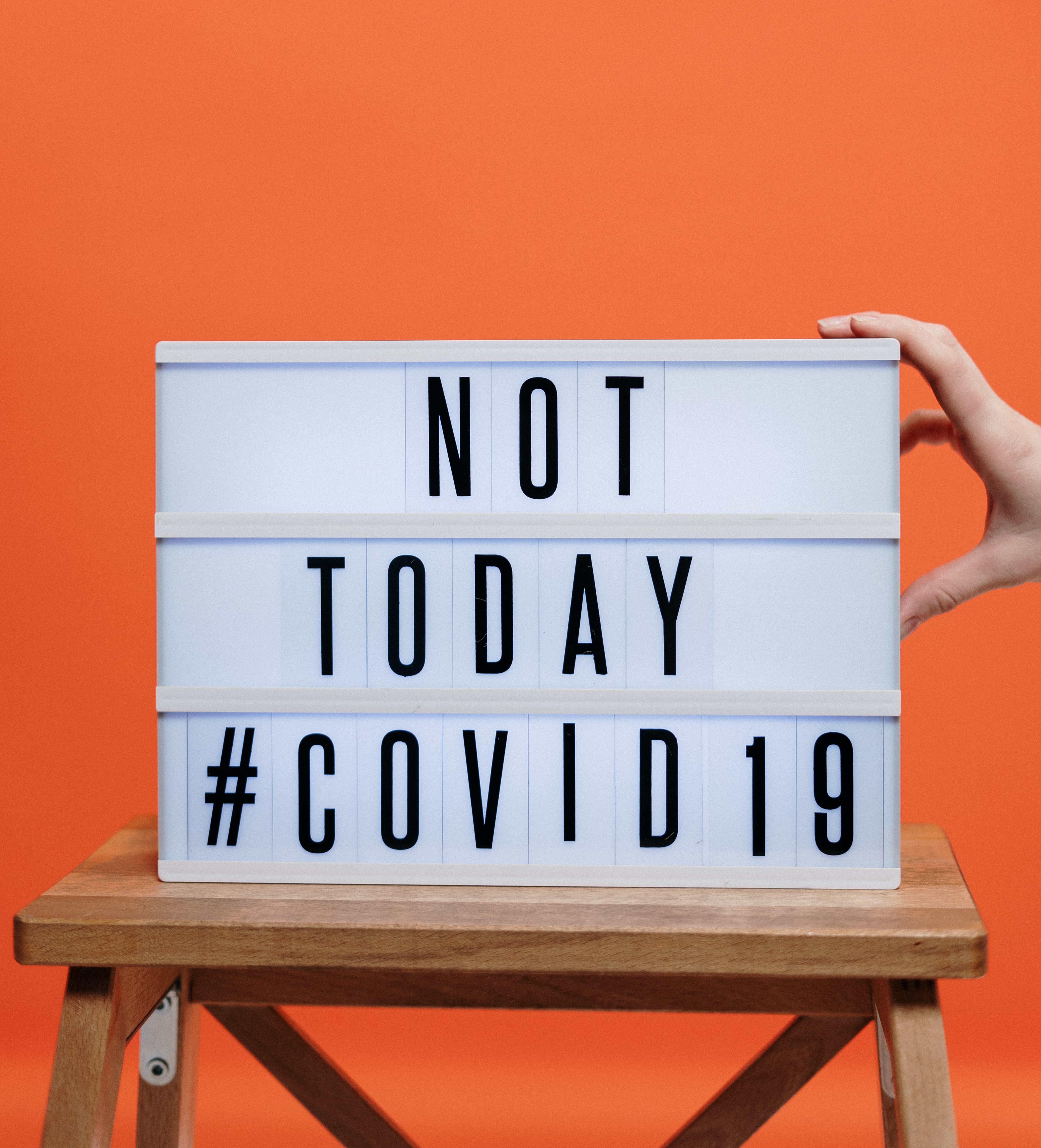 not today covid19 sign on wooden stool 3952231 1