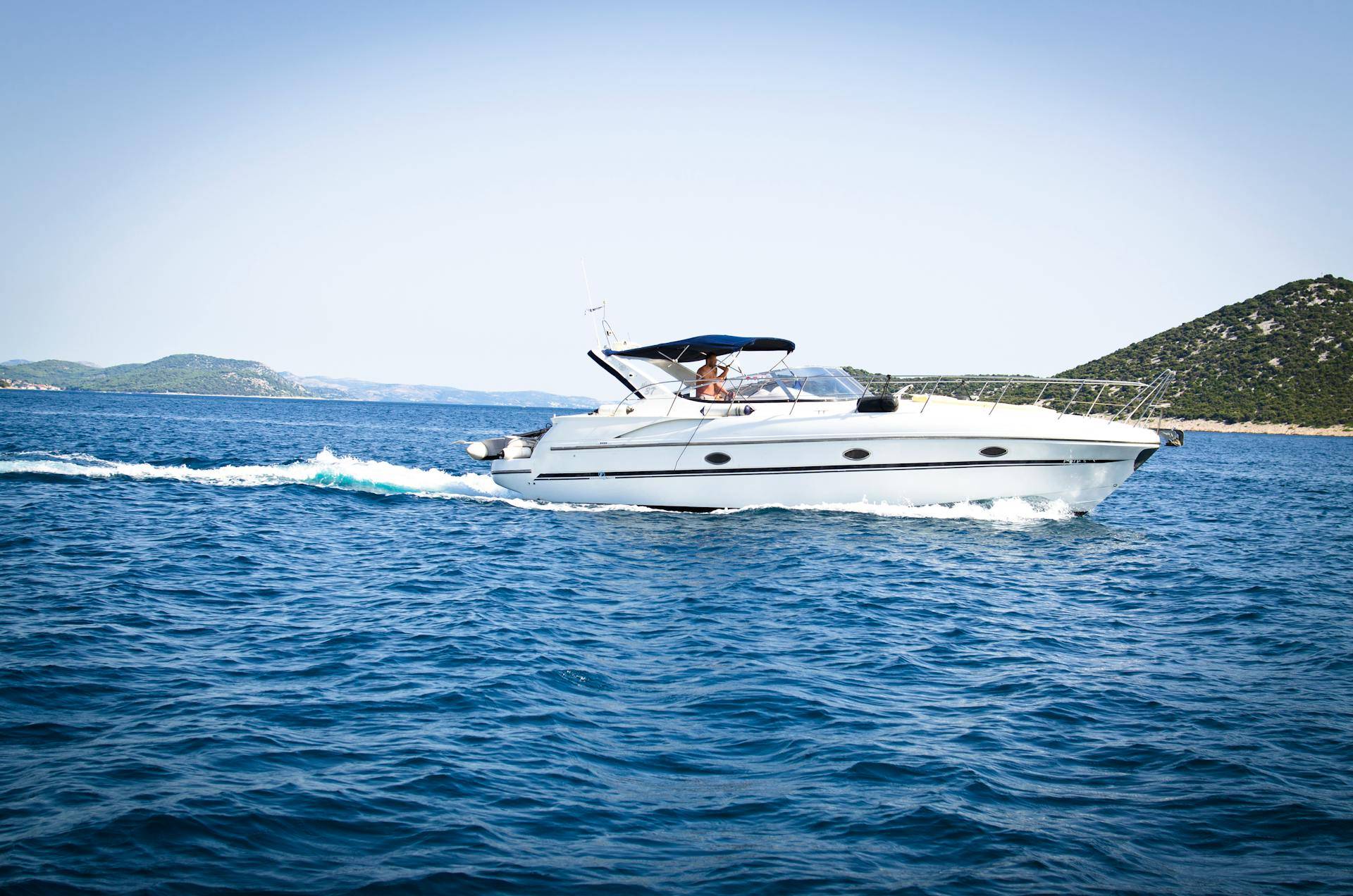 a Boat on the Water, Representing the Benefits to Customer Satisfaction that Technical Documentation and an Owner's Manual Can Create