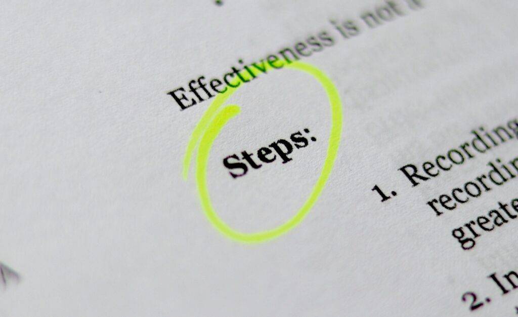 A Document With the Word "Steps" Highlighted, Representing the Importance of Having Clear Steps in a Training Manual