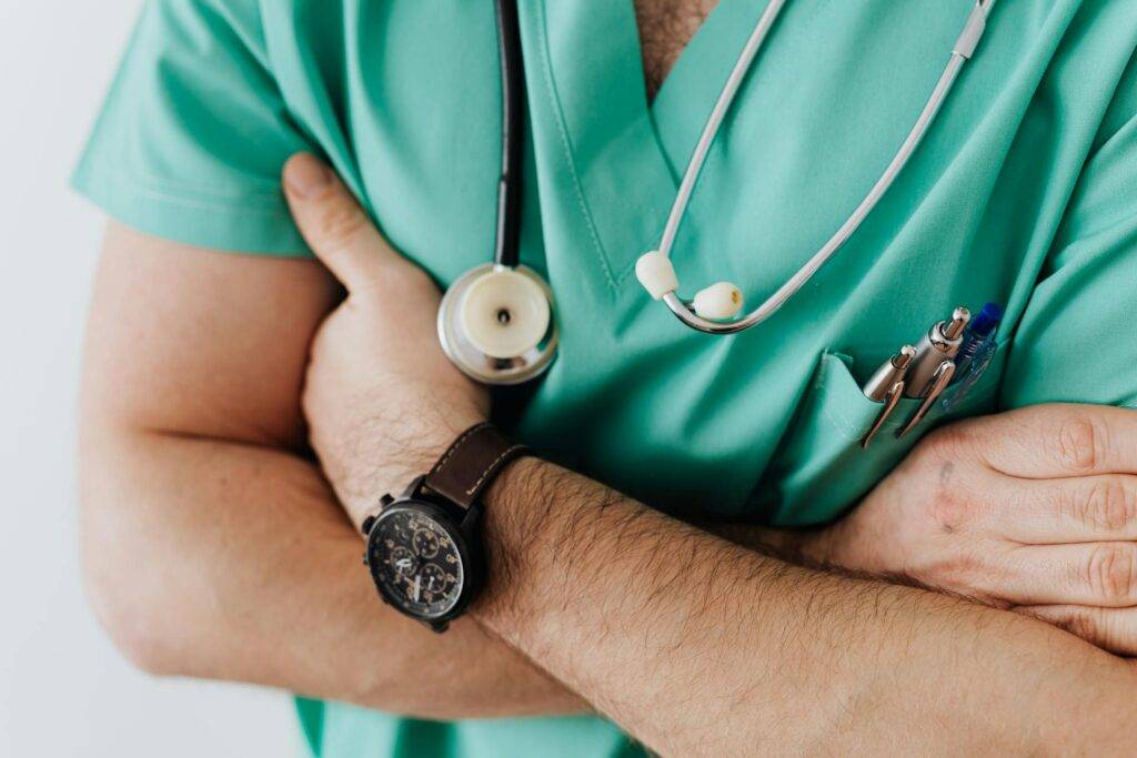 a Doctor with Arms Crossed, Establishing Authority which Medical Writers Contribute to