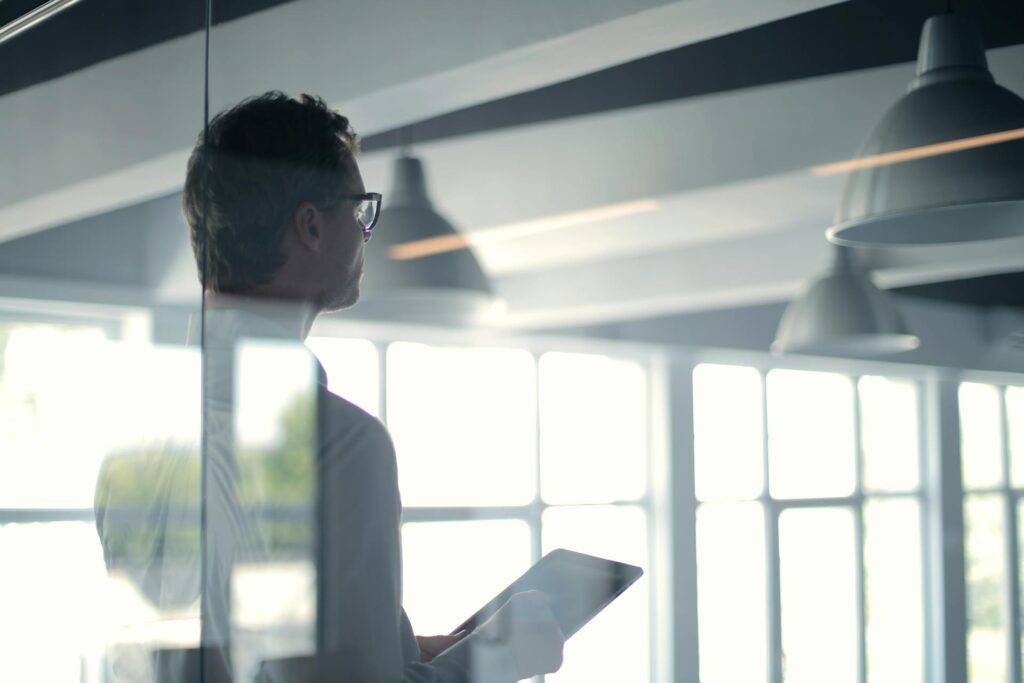 Professional Technical Writers Looking over Information in a Conference Room